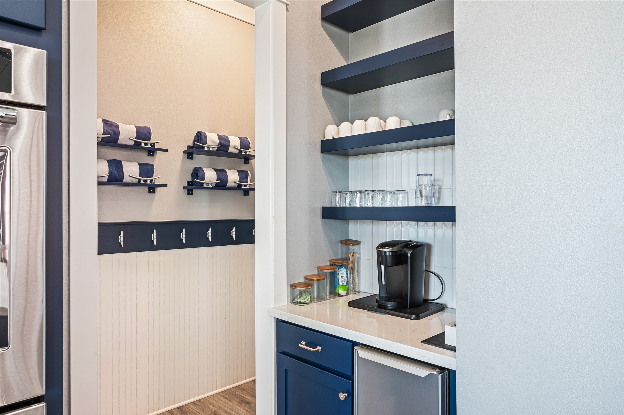 2576 Whitecap Crystal Beach, TX 77650 - Photo 22 of 49 a kitchen with a refrigerator and cabinets
