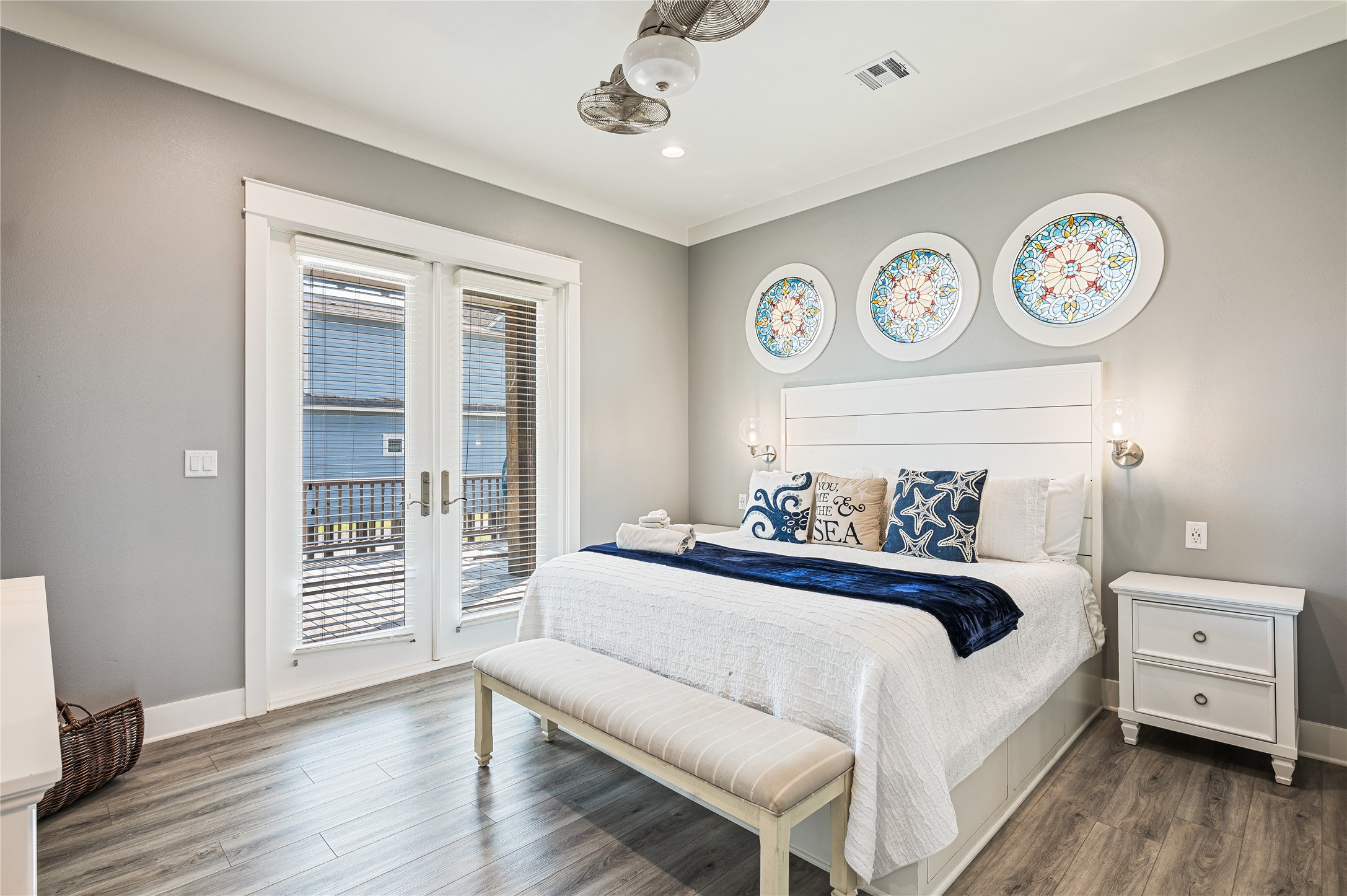 2576 Whitecap Crystal Beach, TX 77650 - Photo 23 of 49 a bedroom with a bed and a lamp