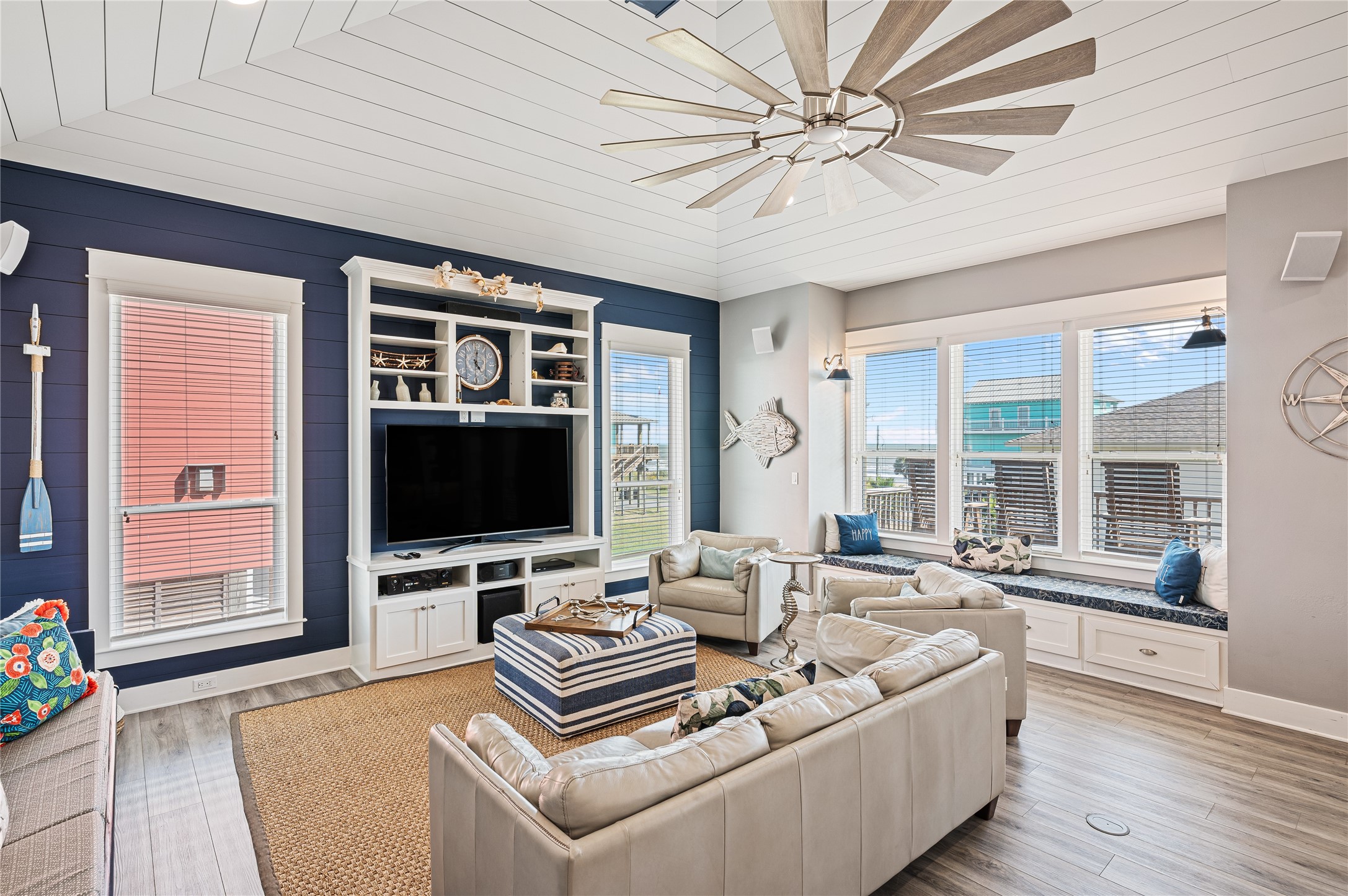2576 Whitecap Crystal Beach, TX 77650 - Photo 3 of 49 a living room with furniture and a flat screen tv