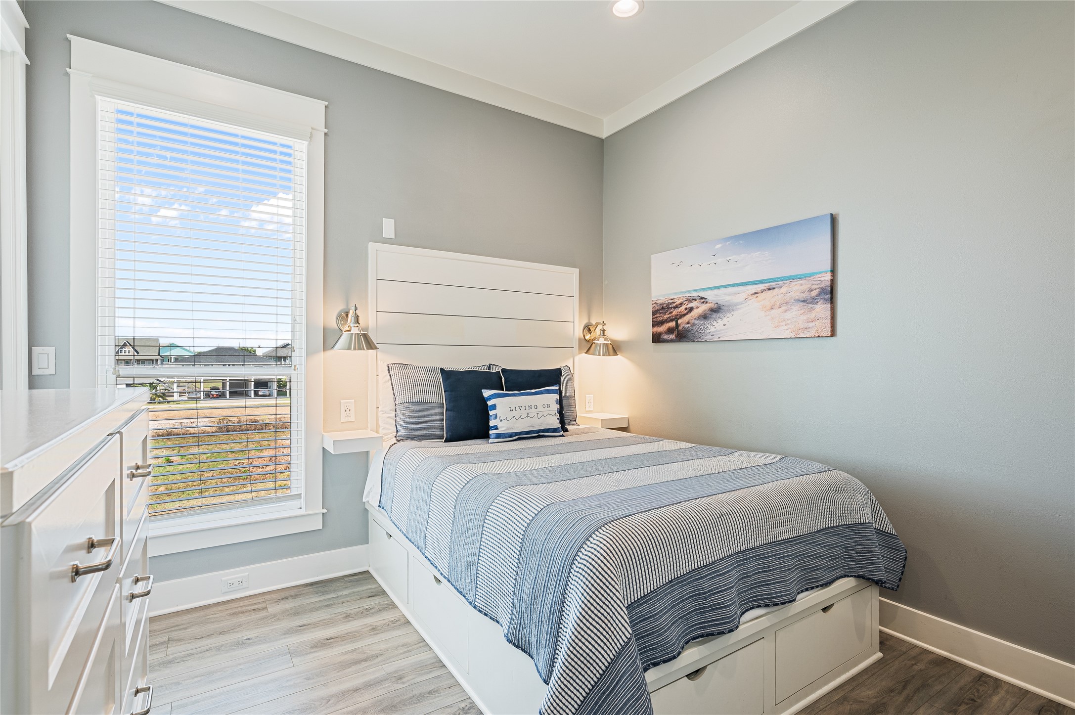 2576 Whitecap Crystal Beach, TX 77650 - Photo 33 of 49 a bedroom with a bed and a window