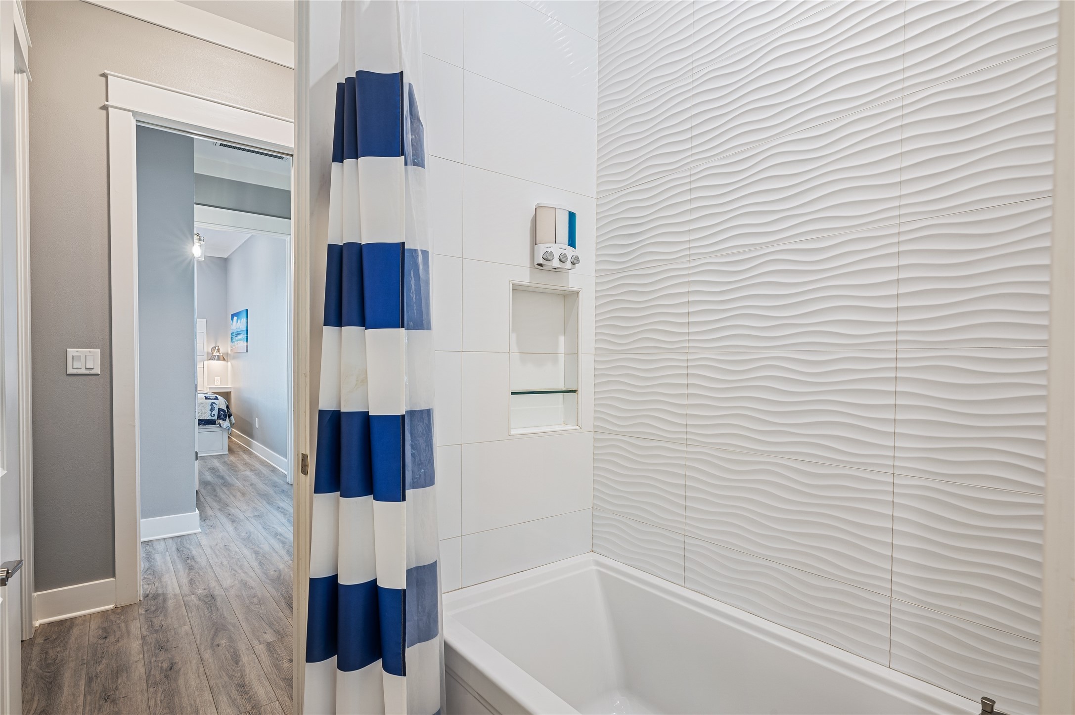 2576 Whitecap Crystal Beach, TX 77650 - Photo 36 of 49 a bathroom with a bathtub and shower