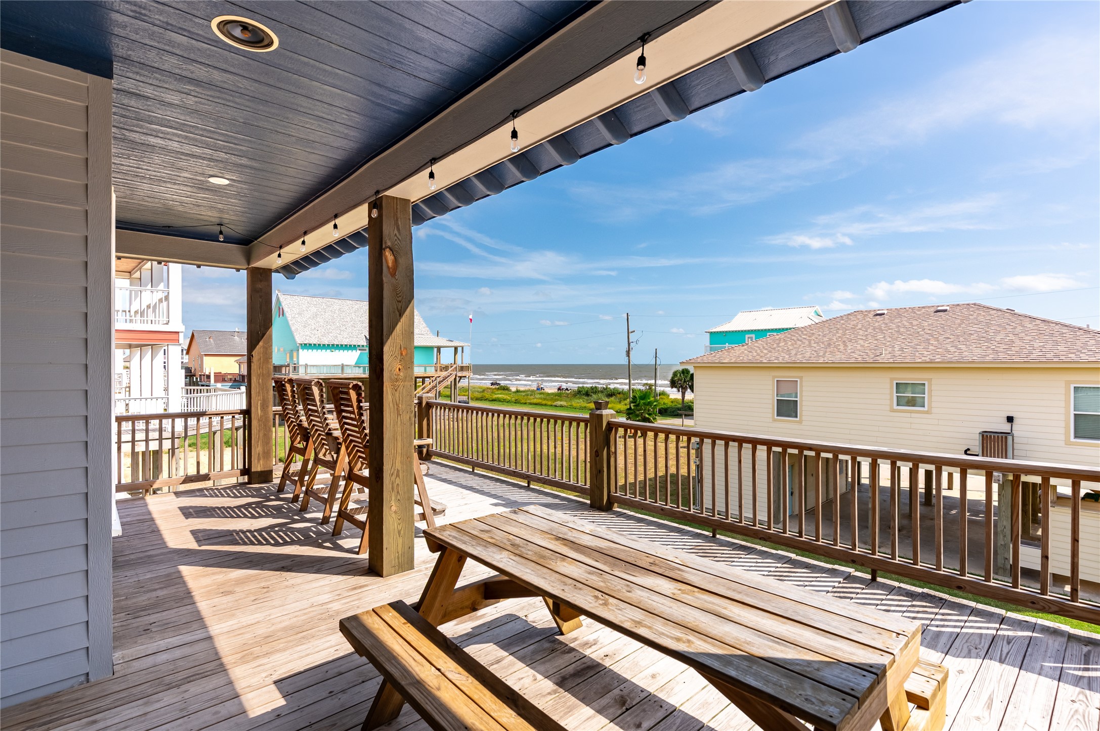 2576 Whitecap Crystal Beach, TX 77650 - Photo 10 of 49 a view of balcony with wooden floor