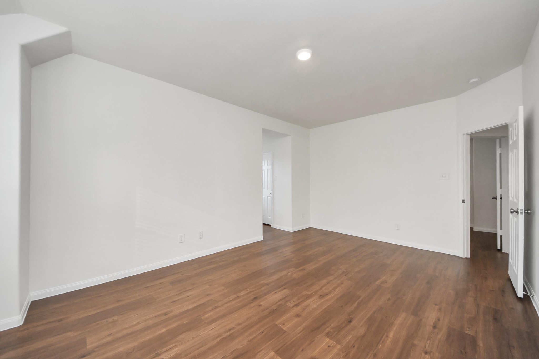 886 Darbydale Crossing Lane Houston, TX 77090 - Photo 20 of 41 a view of empty room with wooden floor