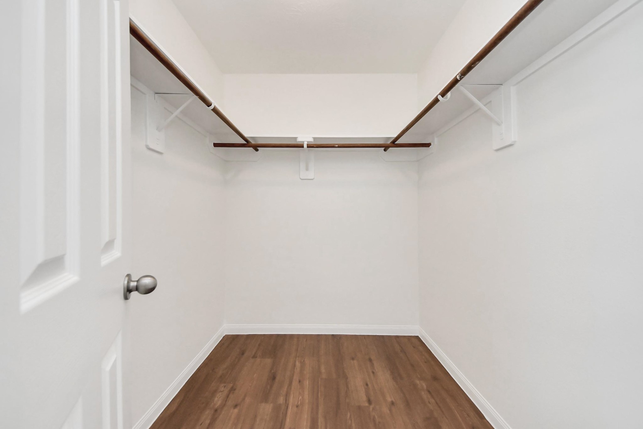 886 Darbydale Crossing Lane Houston, TX 77090 - Photo 25 of 41 a view of a room with wooden floor