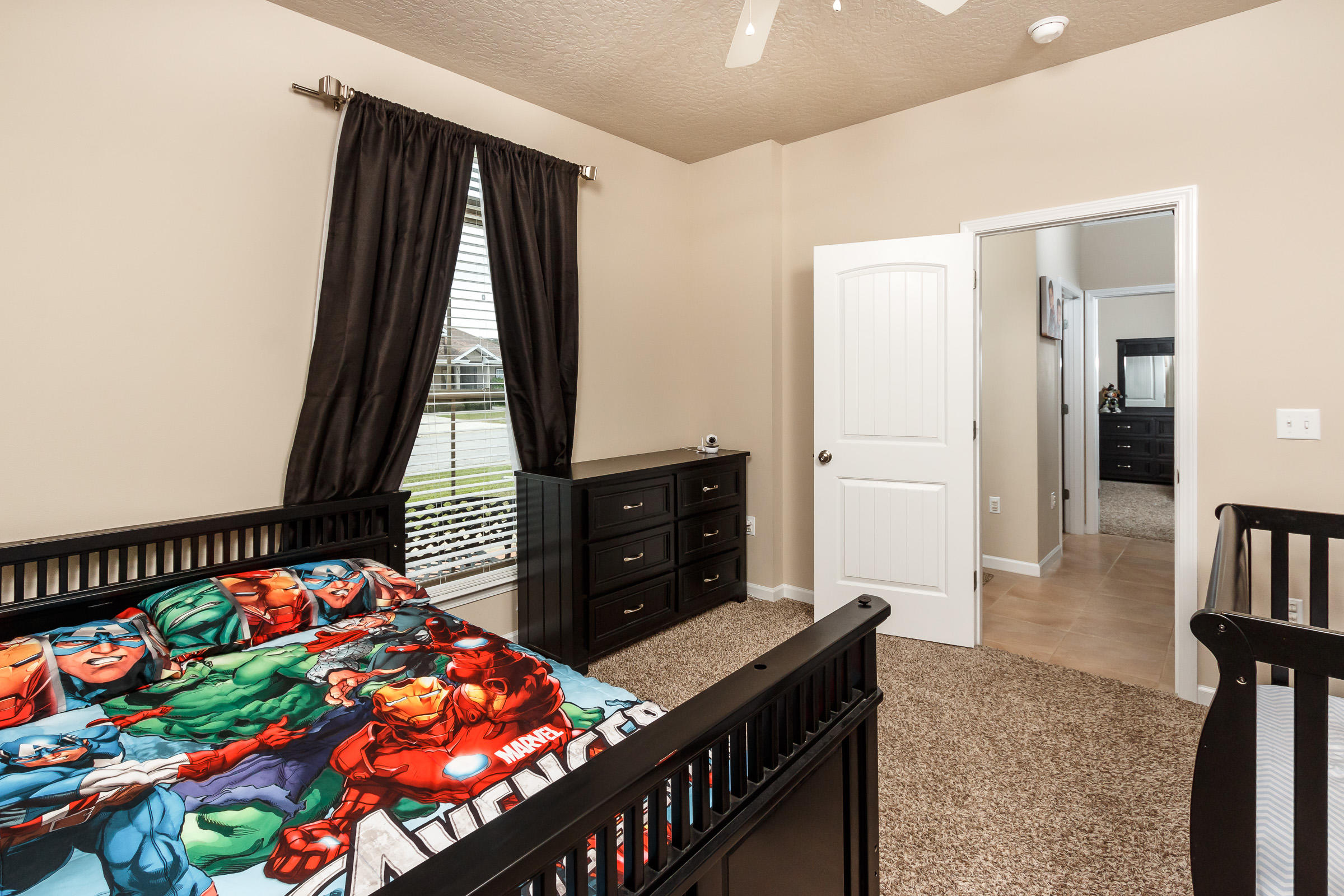 4600 Hermosa Road Crestview, FL 32539 - Photo 27 of 40 a bedroom with furniture and a baby crib