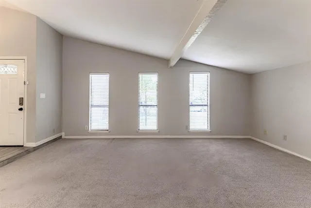 a view of an empty room with window