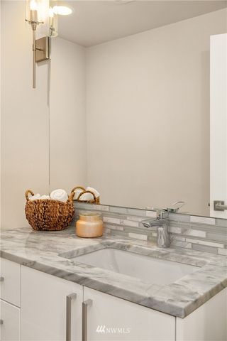 a kitchen with a sink and a stove