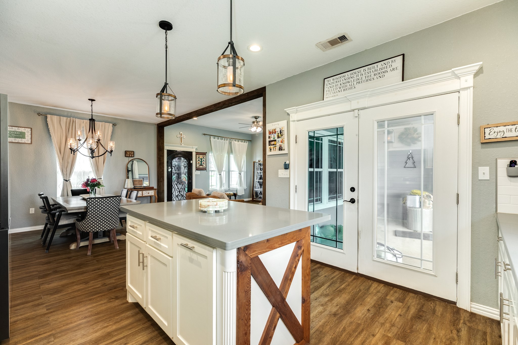 613 Winchester Trail Angleton, TX 77515 - Photo 18 of 32 a view of a kitchen counter space and wooden floor