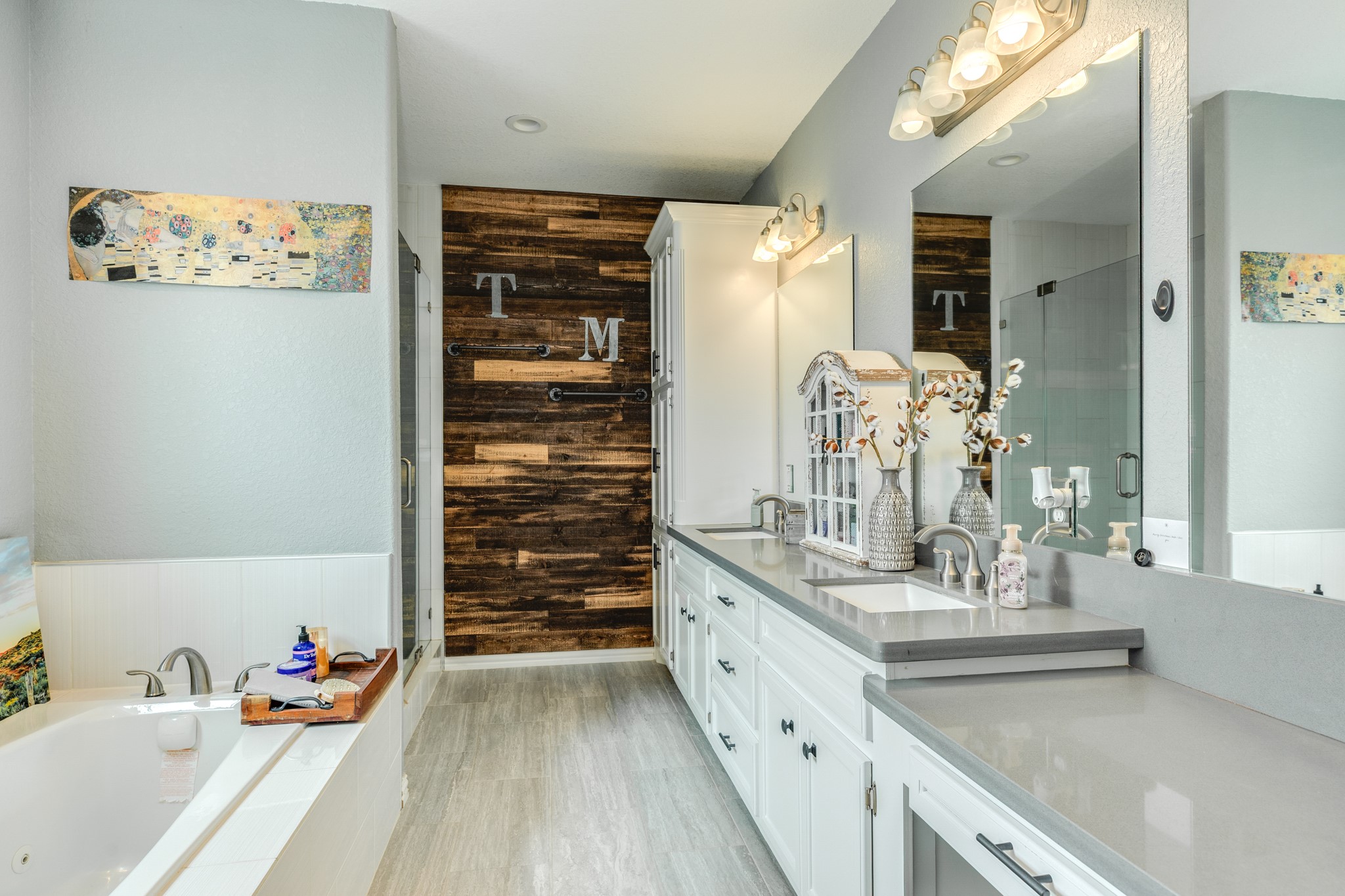 613 Winchester Trail Angleton, TX 77515 - Photo 21 of 32 a bathroom with a double vanity sink mirror and shower