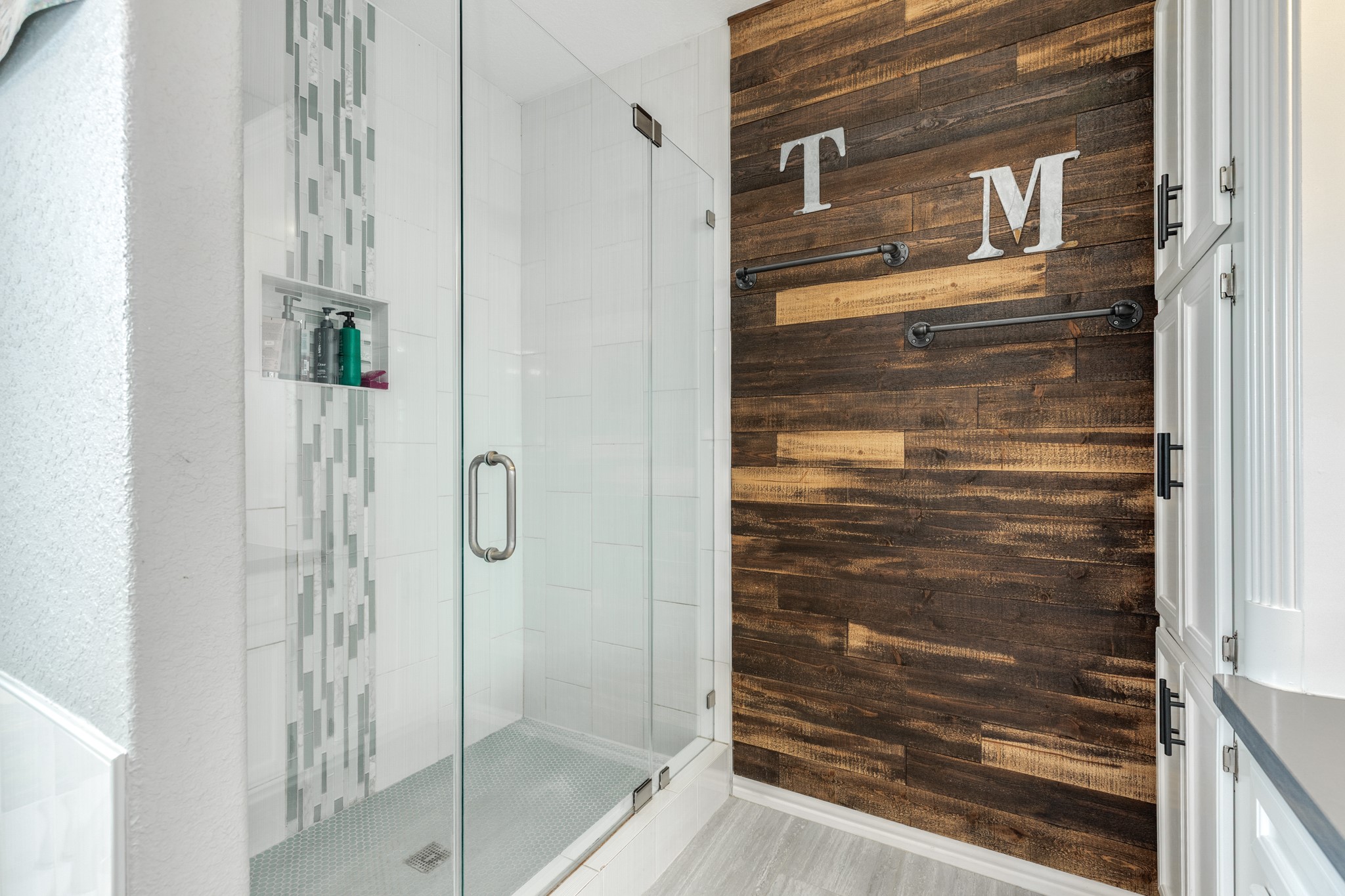 613 Winchester Trail Angleton, TX 77515 - Photo 22 of 32 a bathroom with a shower