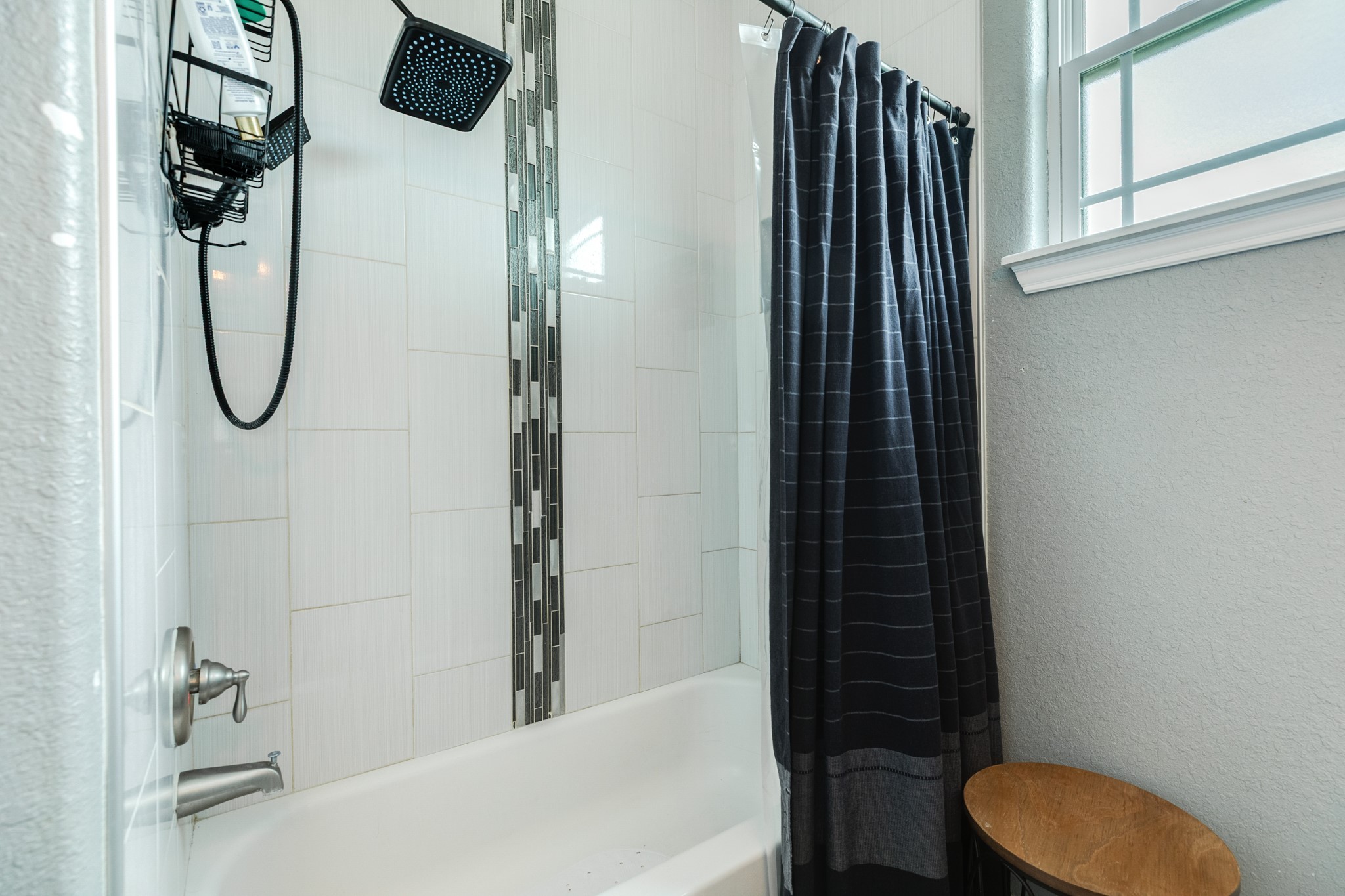 613 Winchester Trail Angleton, TX 77515 - Photo 27 of 32 a bathroom with a shower and a toilet