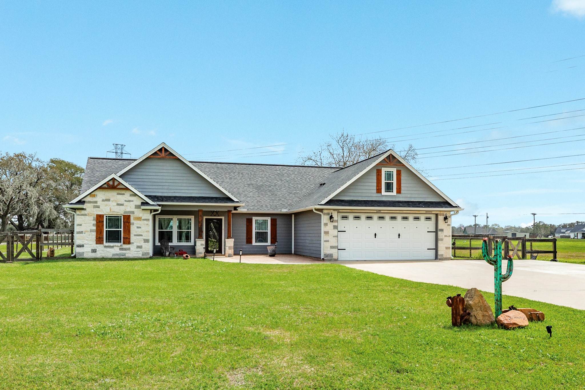 613 Winchester Trail Angleton, TX 77515 - Photo 28 of 32 a front view of a house with a yard