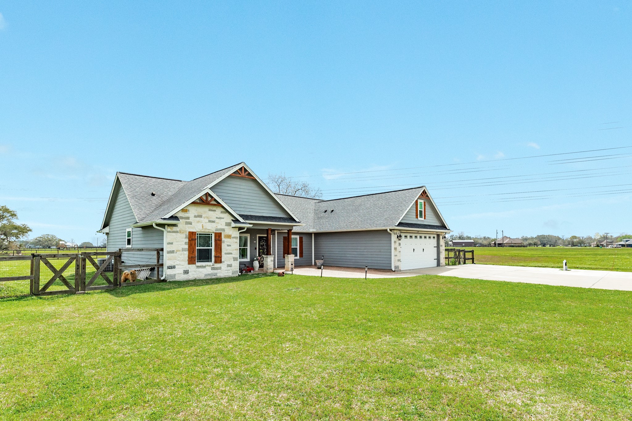 613 Winchester Trail Angleton, TX 77515 - Photo 29 of 32 a front view of a house with garden