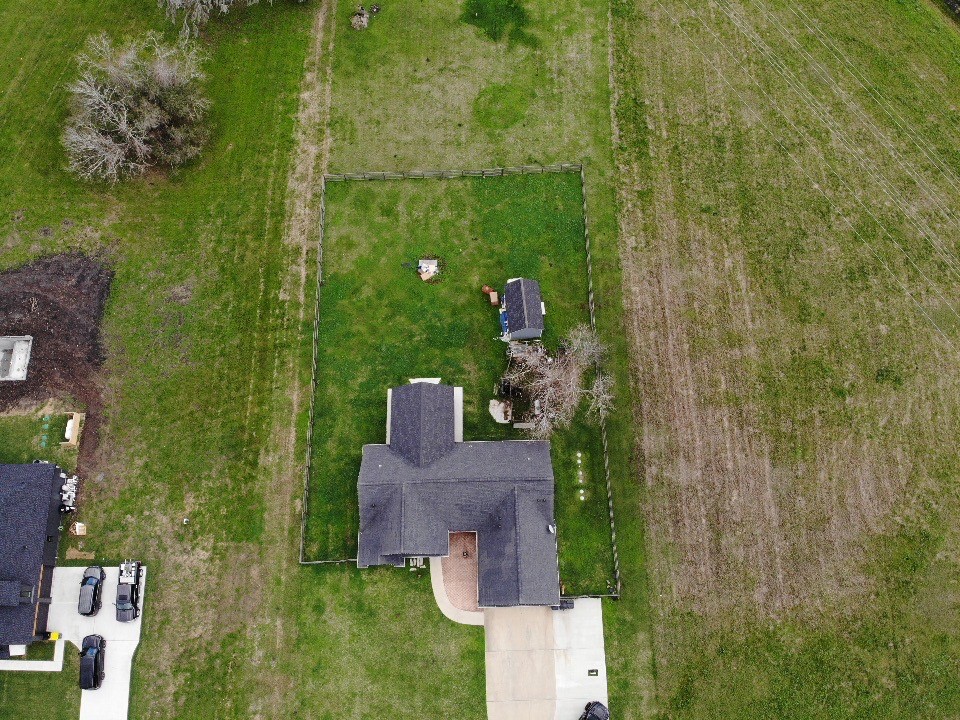 613 Winchester Trail Angleton, TX 77515 - Photo 32 of 32 aerial view of a house with a yard