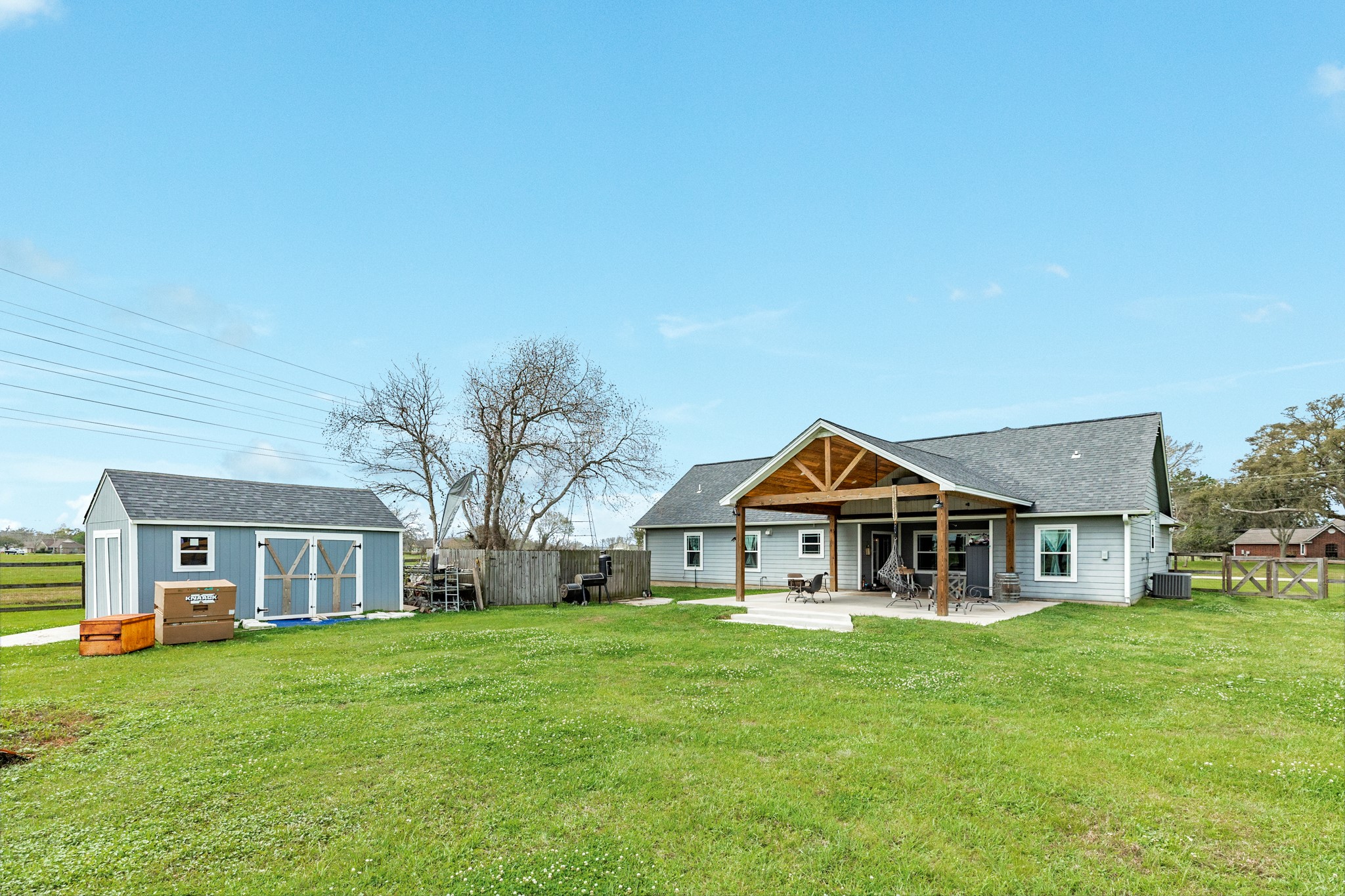 613 Winchester Trail Angleton, TX 77515 - Photo 4 of 32 a view of outdoor space yard and front view of house
