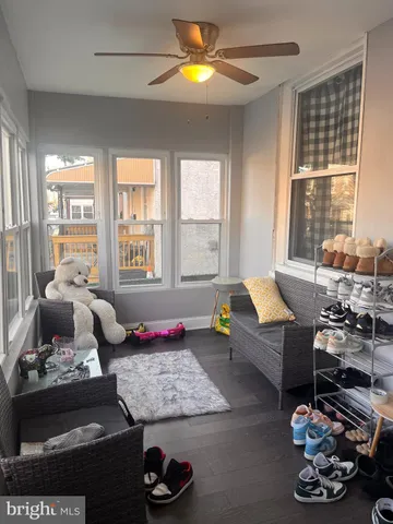 a living room with furniture and window