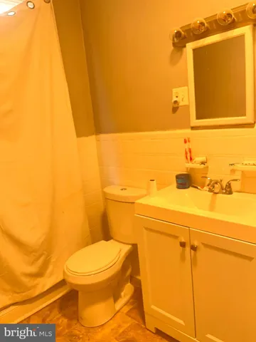 a bathroom with a sink and a toilet
