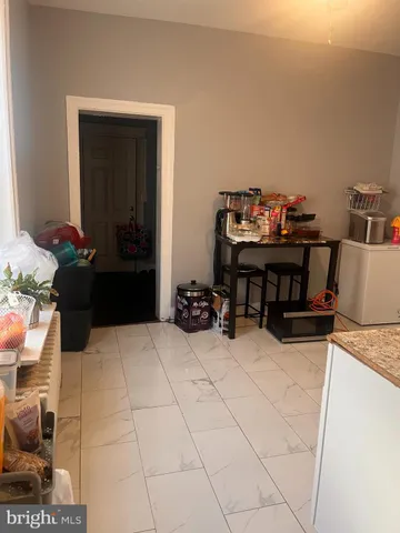 a view of a workspace with furniture