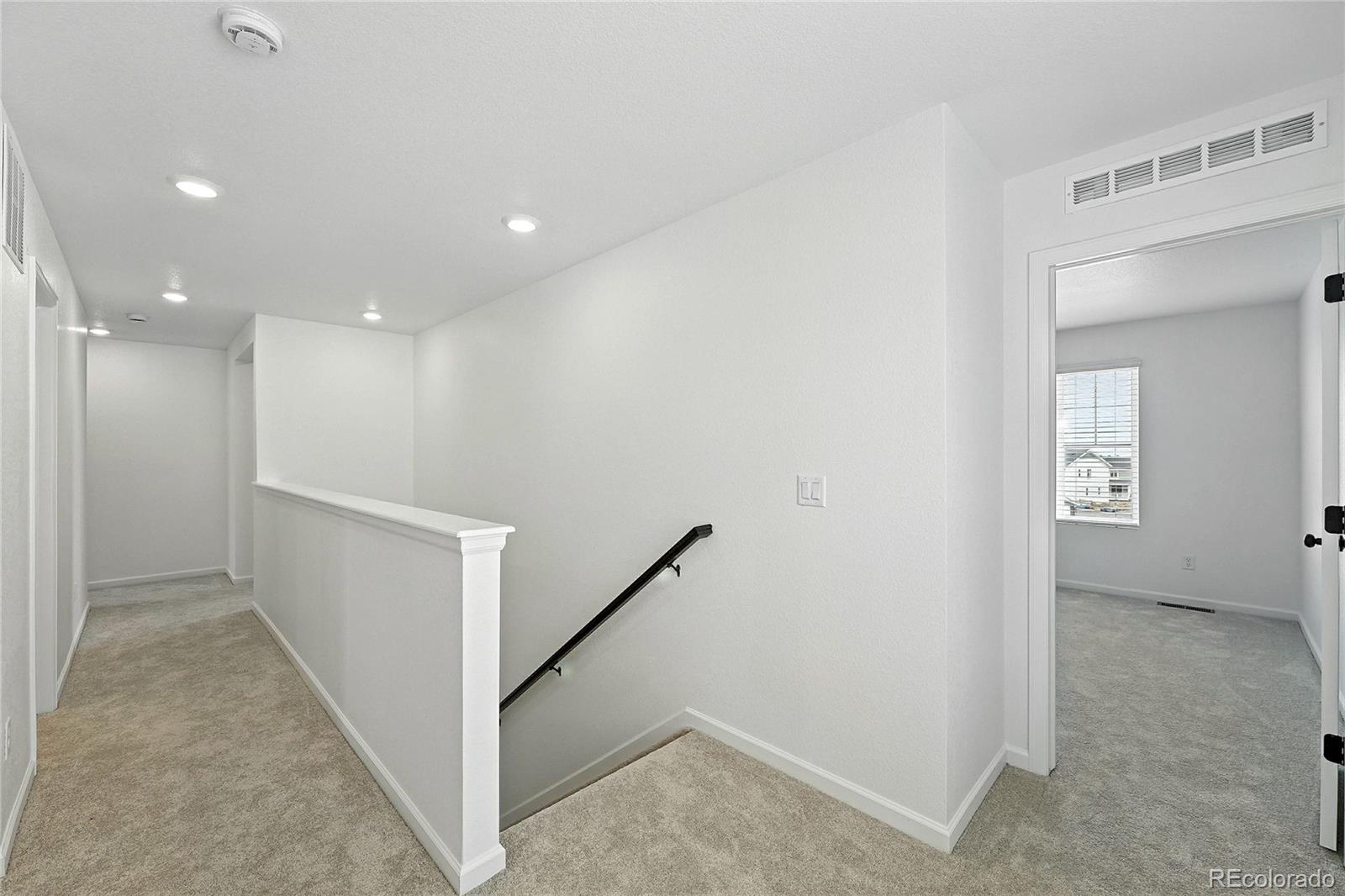 39712 Penn Road Elizabeth, CO 80107 - Photo 13 of 36 a view of a hallway with windows