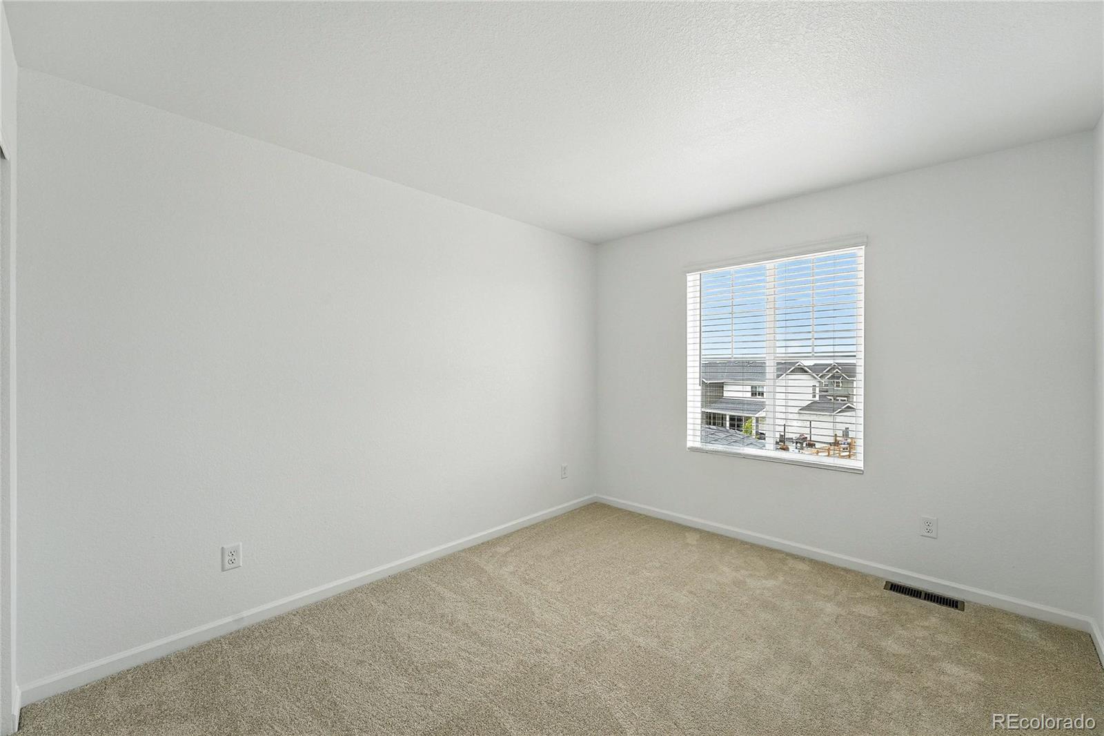 39712 Penn Road Elizabeth, CO 80107 - Photo 14 of 36 an empty room with a window