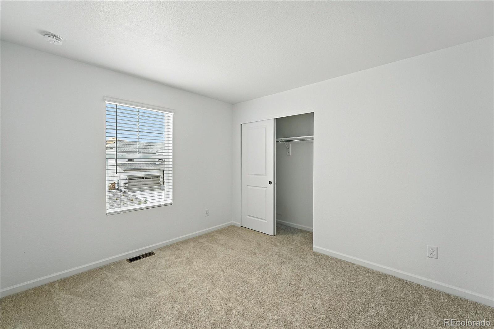 39712 Penn Road Elizabeth, CO 80107 - Photo 16 of 36 an empty room with a window