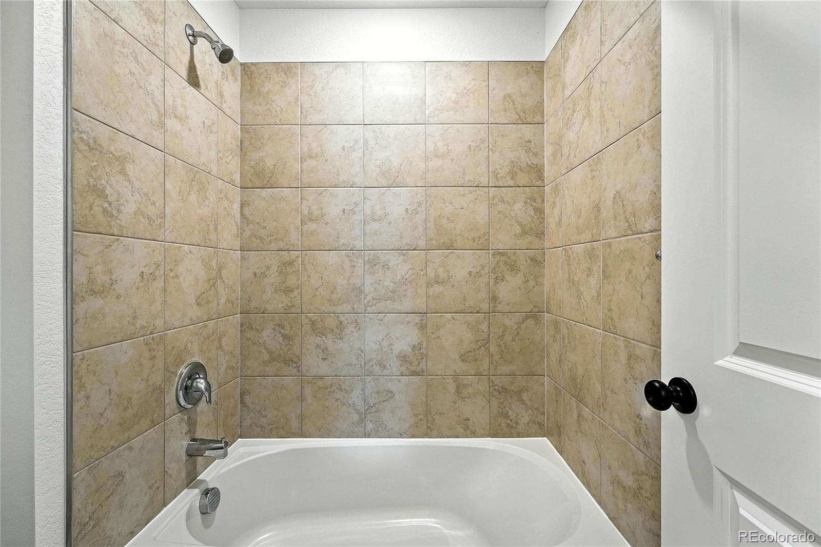 39712 Penn Road Elizabeth, CO 80107 - Photo 18 of 36 a bath tub sitting next to a blue sink