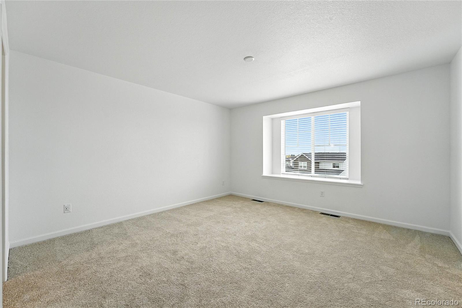 39712 Penn Road Elizabeth, CO 80107 - Photo 19 of 36 an empty room with a window