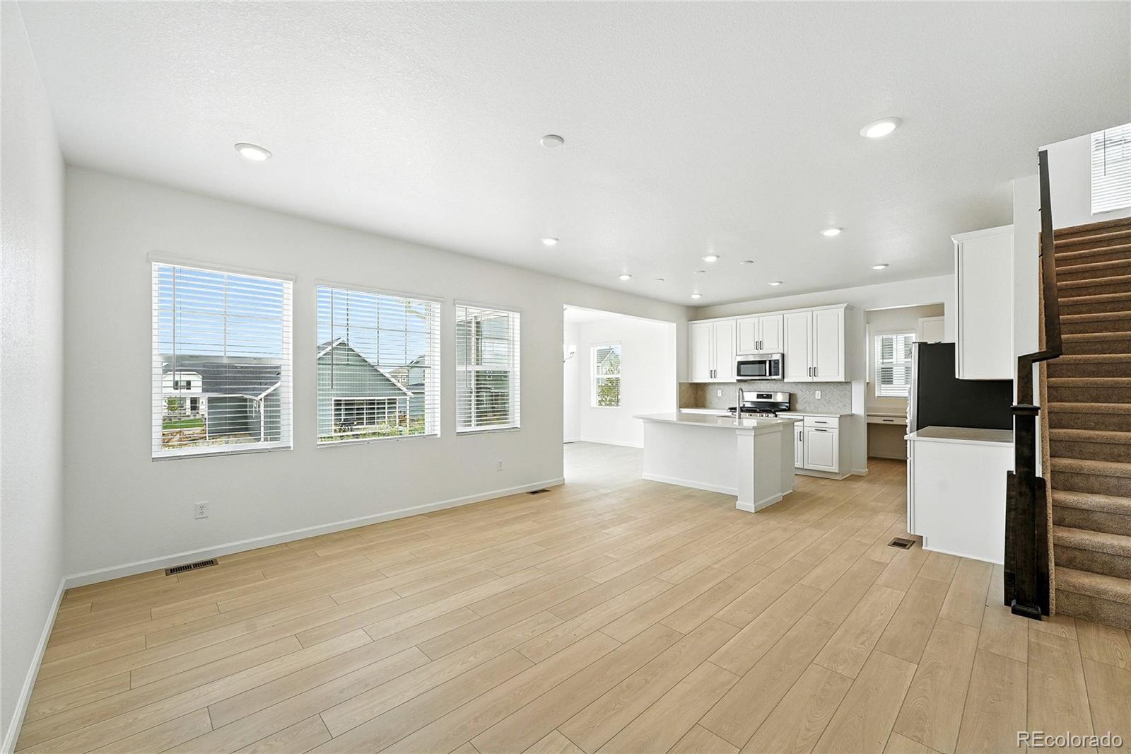 39712 Penn Road Elizabeth, CO 80107 - Photo 2 of 36 a view of kitchen with granite countertop cabinets and refrigerator