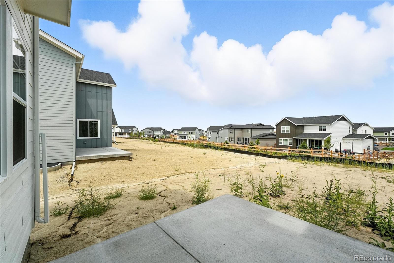 39712 Penn Road Elizabeth, CO 80107 - Photo 23 of 36 a view of a lake with a houses