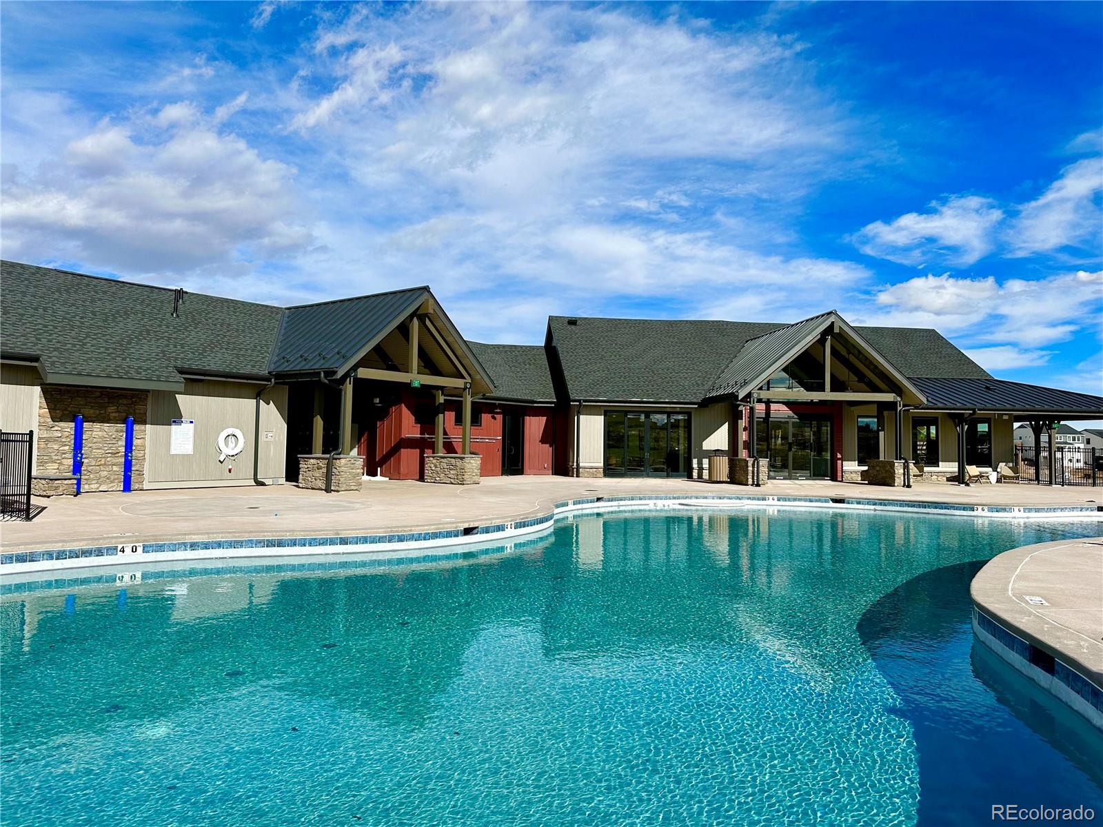 39712 Penn Road Elizabeth, CO 80107 - Photo 36 of 36 a view of pool with table and chairs under an umbrella