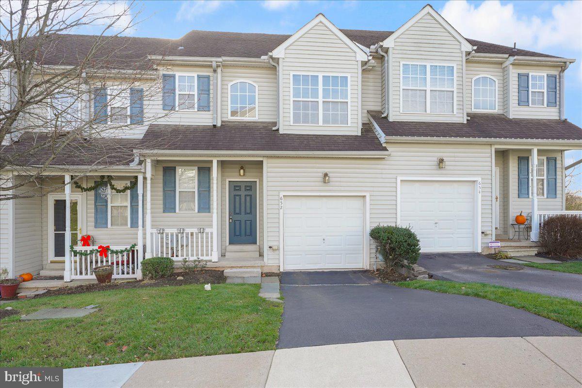 652 Onward Avenue, Unit 56 Phoenixville, PA 19460 - Photo 2 of 35 a view of a yard in front view of a house