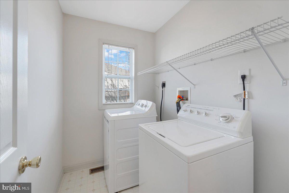 652 Onward Avenue, Unit 56 Phoenixville, PA 19460 - Photo 23 of 35 a utility room with dryer and washer