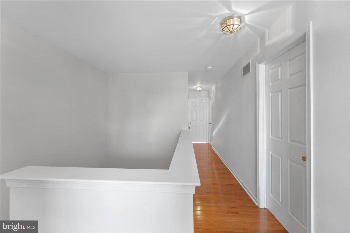 652 Onward Avenue, Unit 56 Phoenixville, PA 19460 - Photo 24 of 35 a view of a hallway with staircase