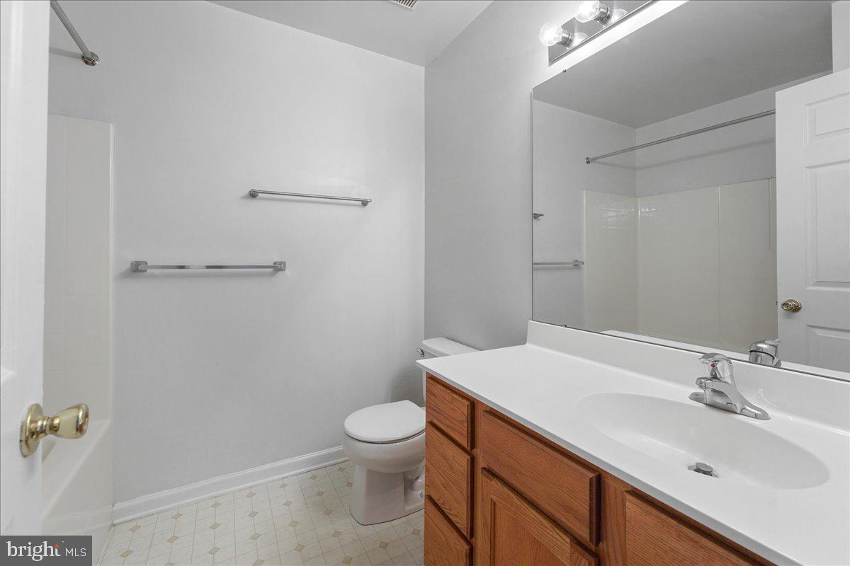 652 Onward Avenue, Unit 56 Phoenixville, PA 19460 - Photo 29 of 35 a bathroom with a sink toilet and vanity