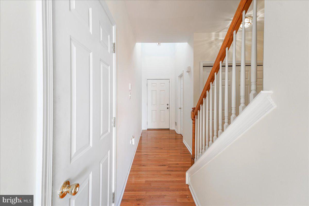 652 Onward Avenue, Unit 56 Phoenixville, PA 19460 - Photo 4 of 35 a view of a hallway with wooden floor and entryway