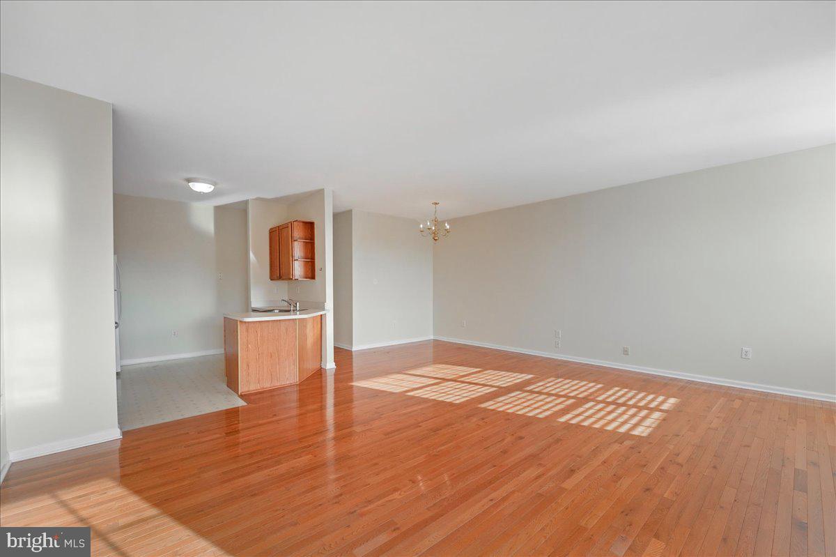 652 Onward Avenue, Unit 56 Phoenixville, PA 19460 - Photo 10 of 35 a view of empty room with wooden floor