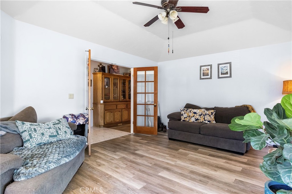 18888 Pellisier Road Tehachapi, CA 93561 - Photo 16 of 43 a living room with furniture and a chandelier