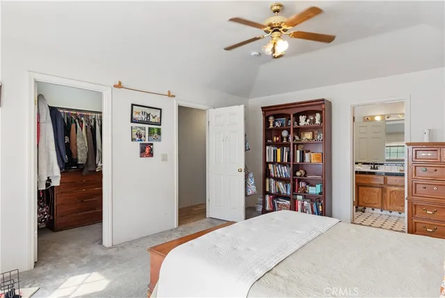 a bedroom with a bed and closet