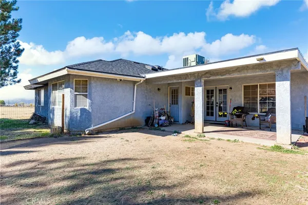 a view of a house with outdoor space and porch