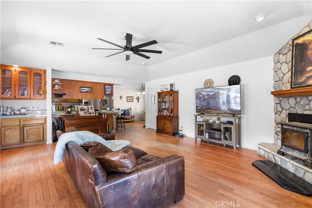 18888 Pellisier Road Tehachapi, CA 93561 - Photo 7 of 43 a living room with furniture and a wooden floor