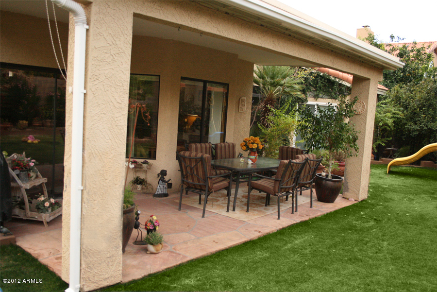5926 East Grandview Road Scottsdale, AZ 85254 - Photo 16 of 18 a view of two chairs in the patio