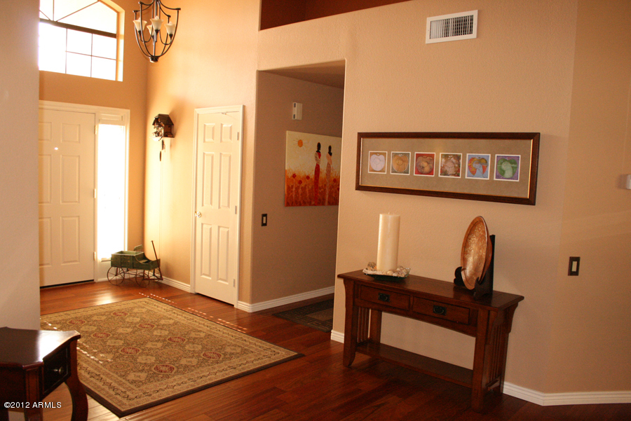 5926 East Grandview Road Scottsdale, AZ 85254 - Photo 3 of 18 a view of a hallway with workspace