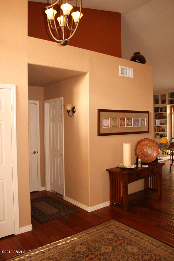5926 East Grandview Road Scottsdale, AZ 85254 - Photo 5 of 18 a view of a livingroom with furniture and wooden floor