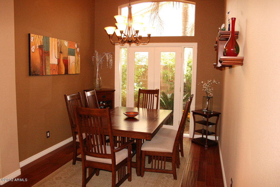 5926 East Grandview Road Scottsdale, AZ 85254 - Photo 6 of 18 a view of a dining room with furniture window and outside view