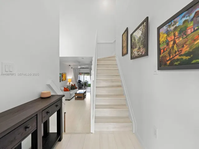 a view of entryway and workspace