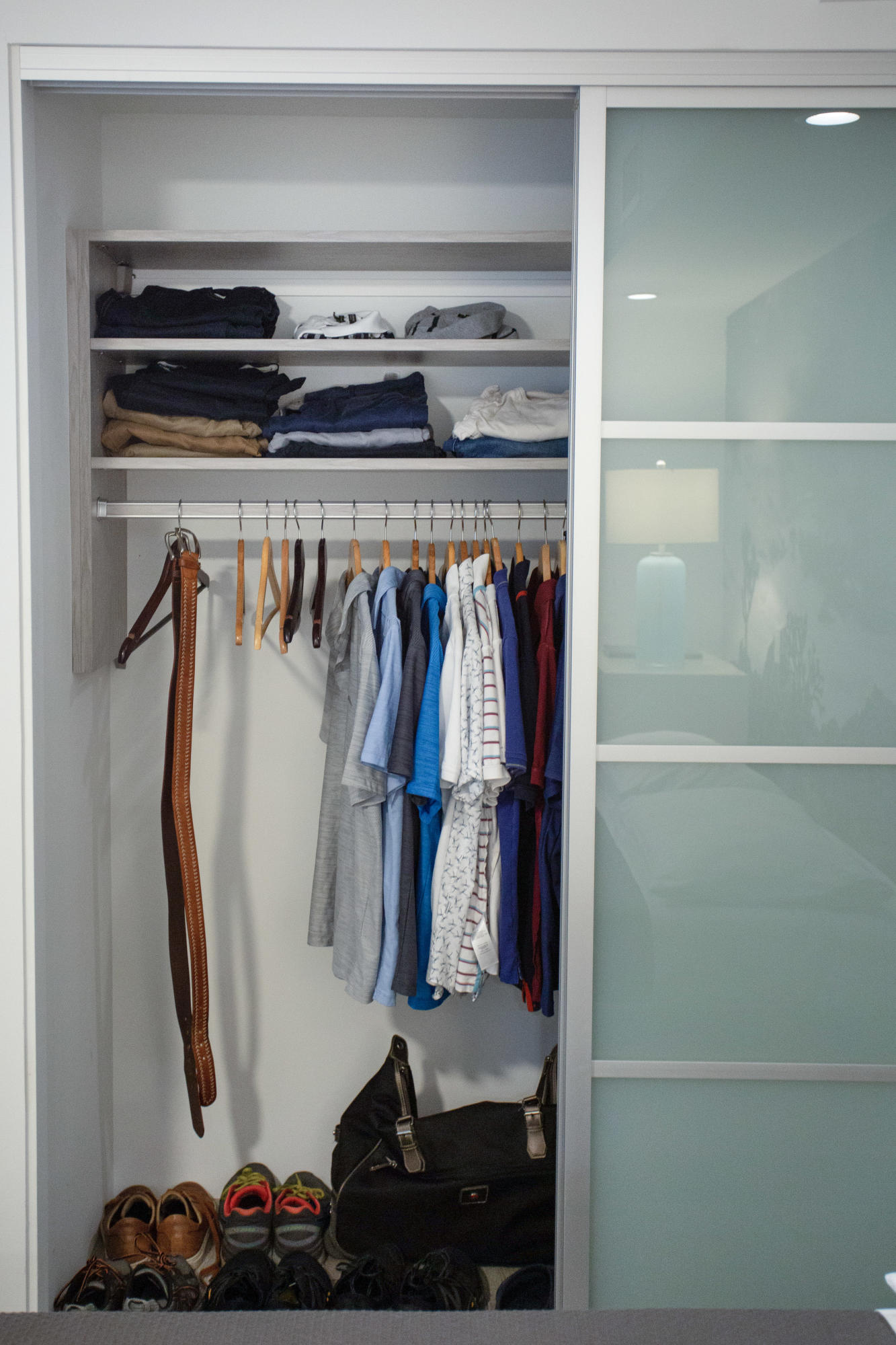 500 East Amado Road, Unit 111 Palm Springs, CA 92262 - Photo 45 of 48 a view of walk in closet with clothes and shoes