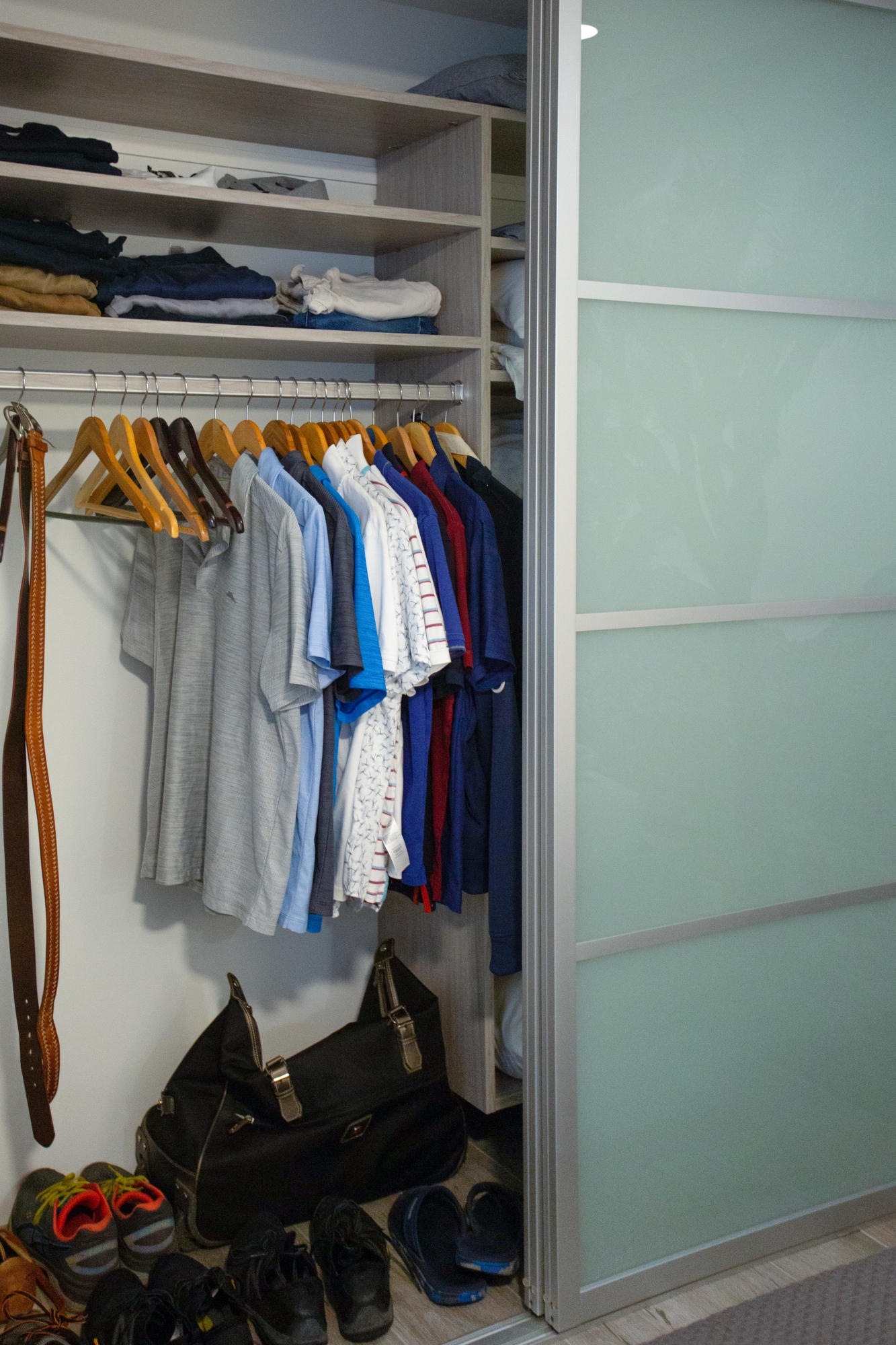 500 East Amado Road, Unit 111 Palm Springs, CA 92262 - Photo 46 of 48 a view of walk in closet with clothes and shoes