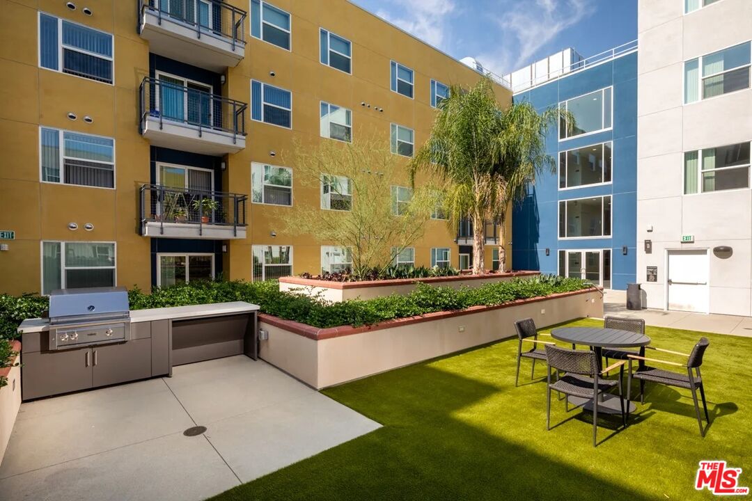 10568 Promenade Gateway, Unit 204 El Monte, CA 91731 - Photo 26 of 34 a view of a building with sitting area