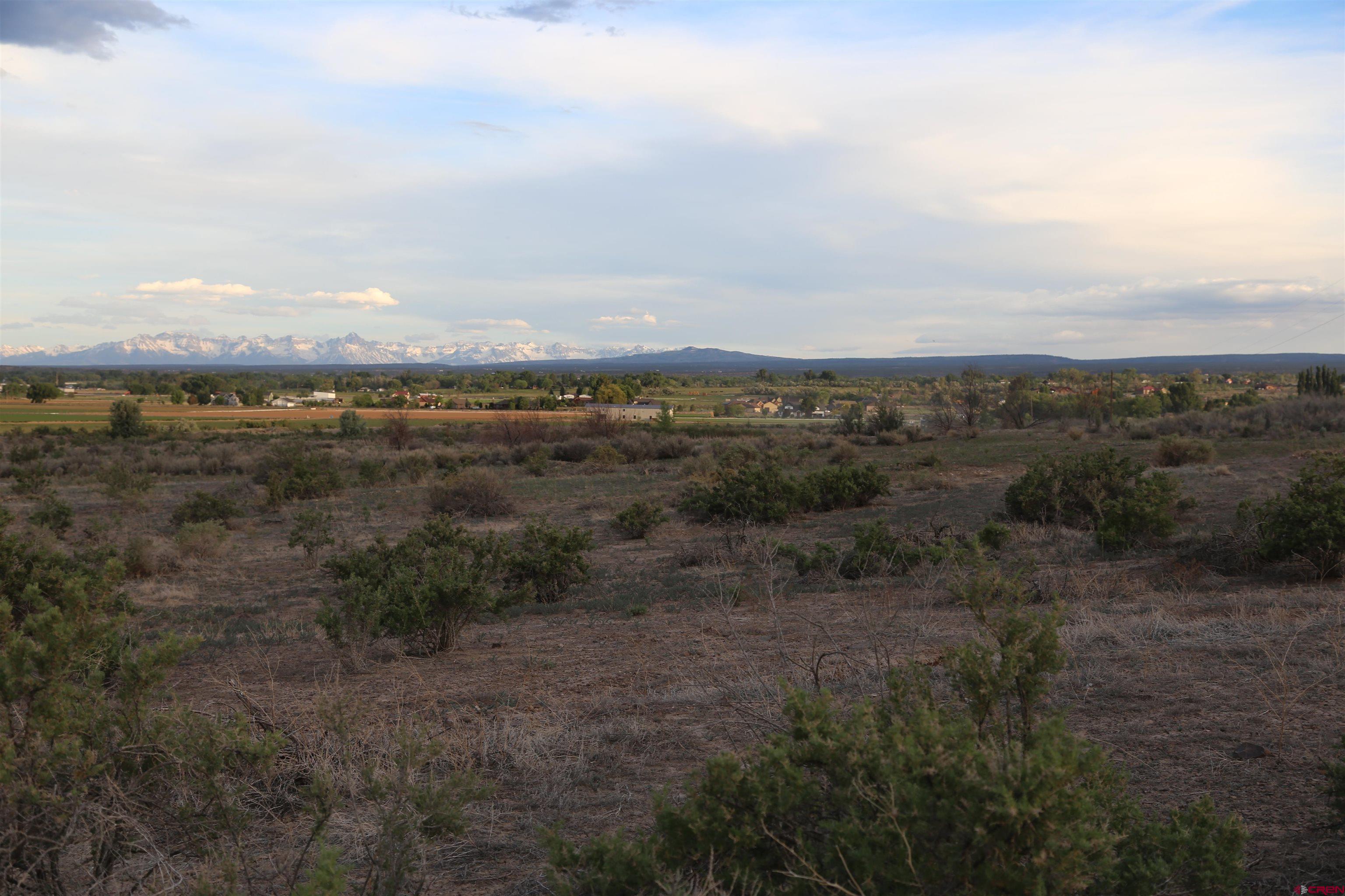 Tdb 5950th Road Montrose, CO 81403 - Photo 1 of 12 a view of an ocean and mountains