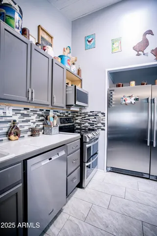 a sink with granite countertop a sink and cabinets